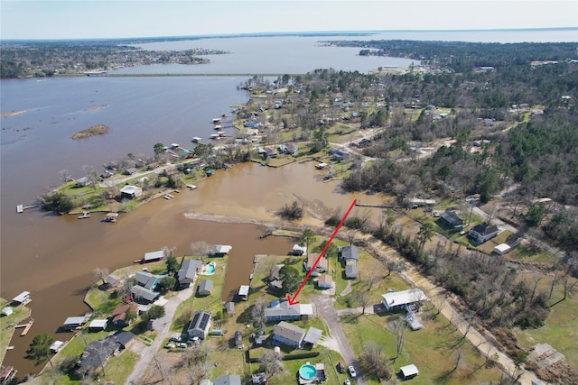 aerial view featuring a residential view and a water view