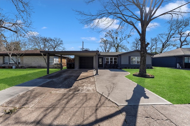 mid-century home featuring an attached garage, concrete driveway, and a front yard