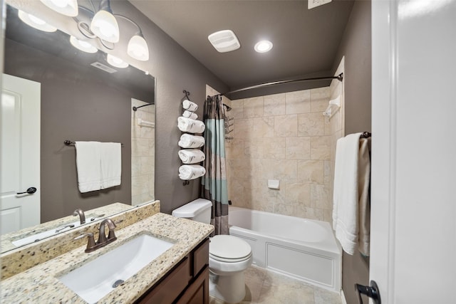 bathroom with visible vents, toilet, shower / tub combo, vanity, and tile patterned flooring