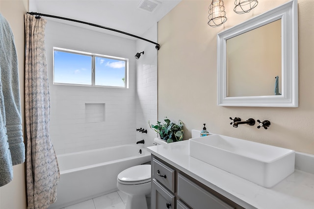 bathroom with shower / bath combo, visible vents, vanity, and toilet