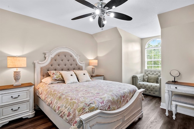 bedroom featuring ceiling fan and dark wood finished floors