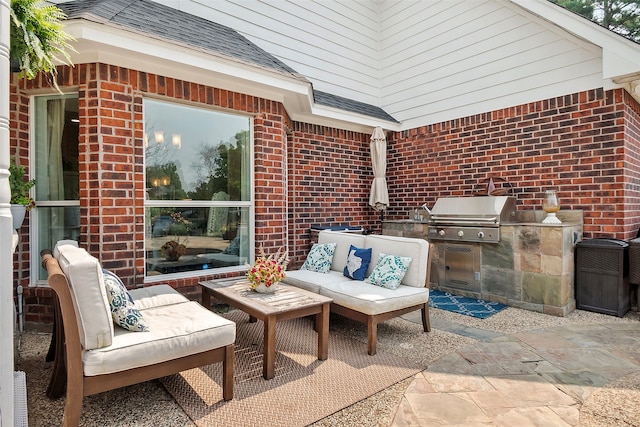 view of patio featuring area for grilling and an outdoor living space