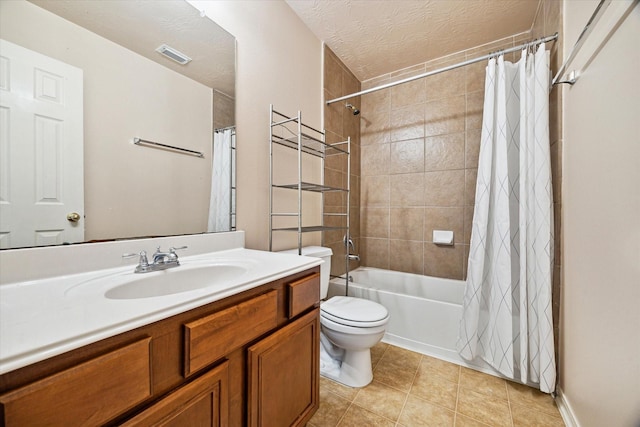 full bathroom featuring visible vents, toilet, shower / bath combo with shower curtain, vanity, and tile patterned flooring