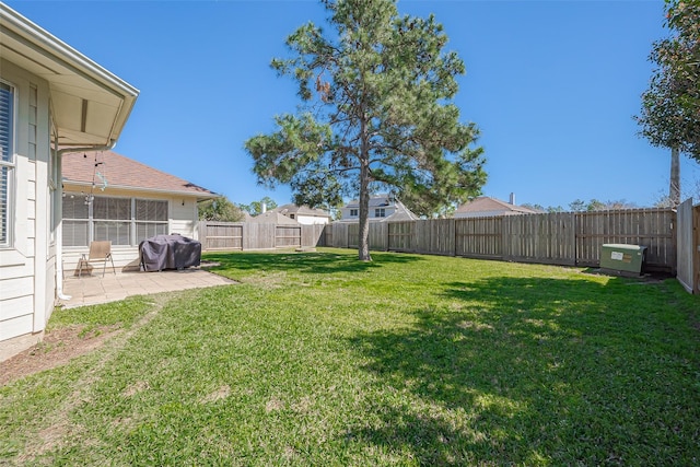 view of yard featuring a fenced backyard and a patio