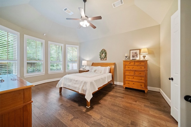 bedroom featuring dark wood-style floors, visible vents, and baseboards