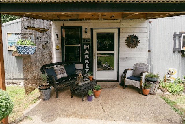 view of exterior entry with an outdoor hangout area