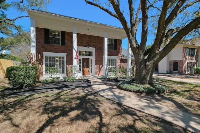 view of front of property featuring brick siding