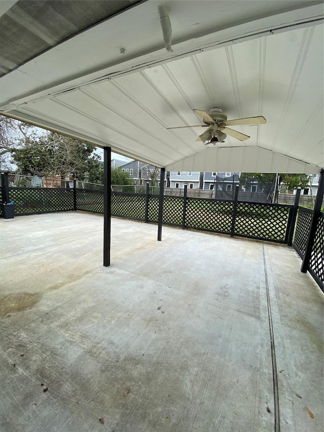 view of patio / terrace with a ceiling fan and fence