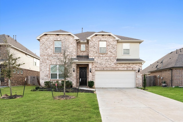 traditional home with brick siding, a shingled roof, a garage, driveway, and a front lawn