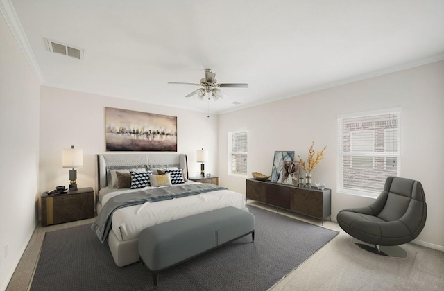 carpeted bedroom with a ceiling fan, visible vents, crown molding, and baseboards