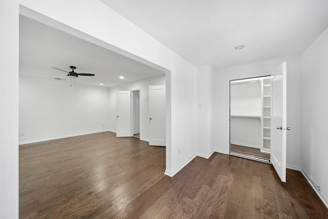 interior space featuring dark wood-style floors, recessed lighting, baseboards, and ceiling fan