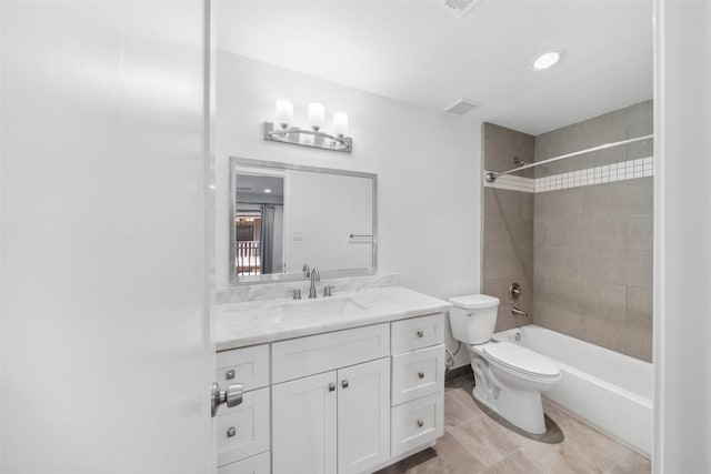 full bathroom with visible vents, toilet, vanity, and bathing tub / shower combination