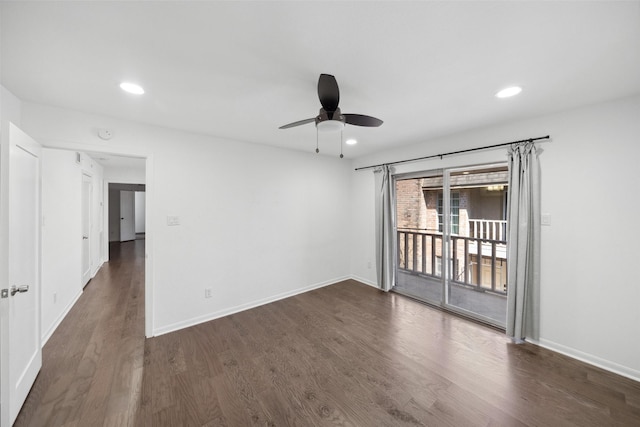 spare room with recessed lighting, baseboards, and wood finished floors