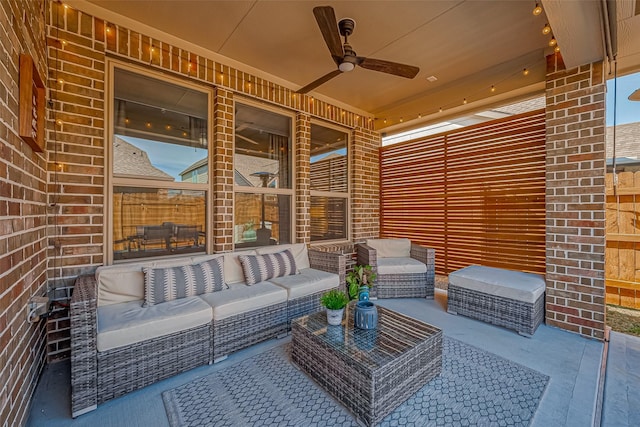 view of patio with ceiling fan and an outdoor hangout area