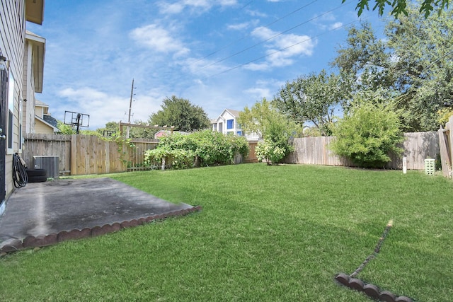 view of yard featuring a patio area and a fenced backyard