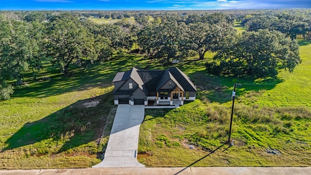 bird's eye view featuring a view of trees