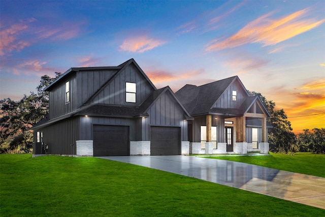 modern inspired farmhouse with driveway, board and batten siding, cooling unit, and a lawn