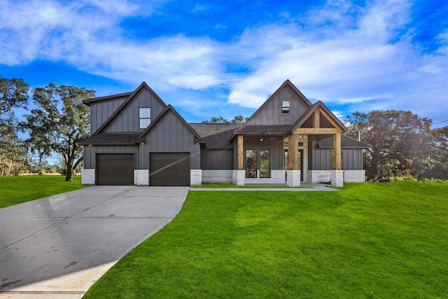 modern farmhouse featuring a garage, a shingled roof, concrete driveway, a front lawn, and board and batten siding