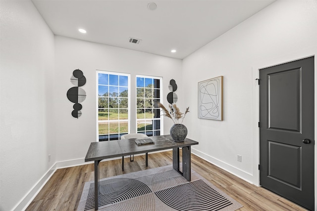 office with recessed lighting, visible vents, baseboards, and wood finished floors