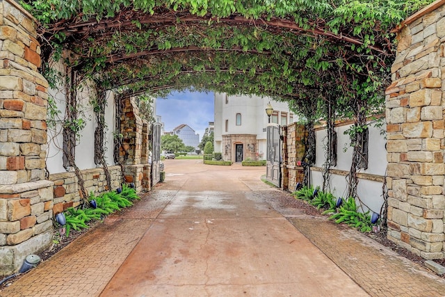 exterior space with concrete driveway