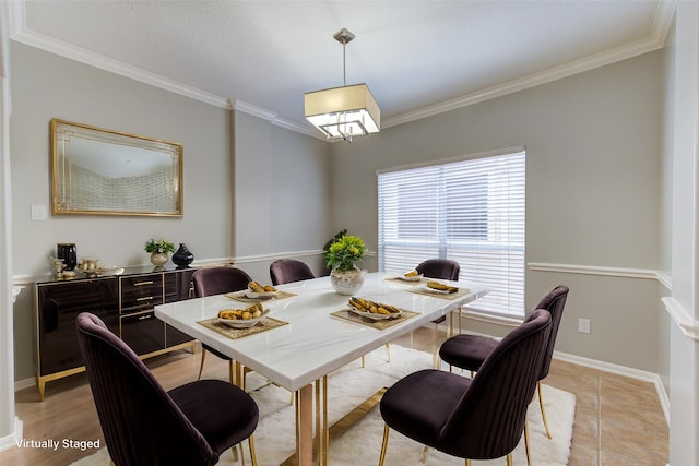 dining space with crown molding, baseboards, and light tile patterned floors