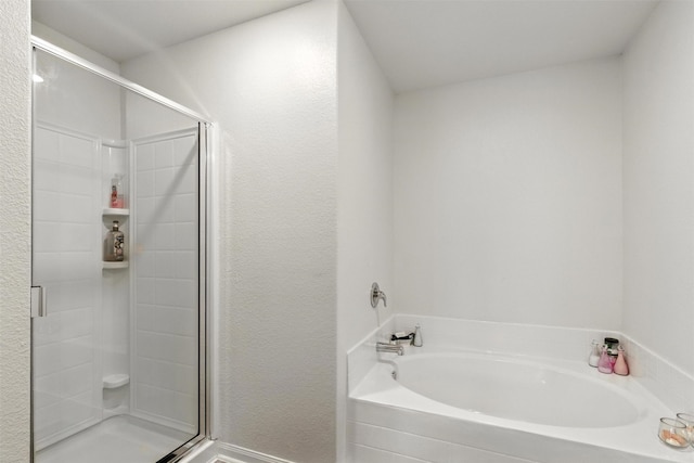 22052 Angelico Dr, Magnolia, TX 77355 - full bath featuring a stall shower and a garden tub