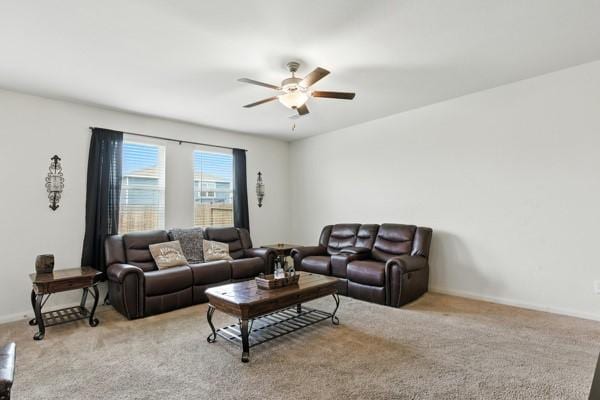 22052 Angelico Dr, Magnolia, TX 77355 - carpeted living room with a ceiling fan and baseboards