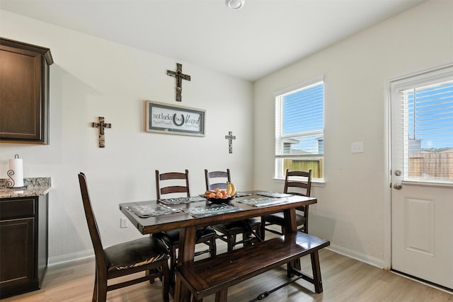 22052 Angelico Dr, Magnolia, TX 77355 - dining area featuring light wood-type flooring