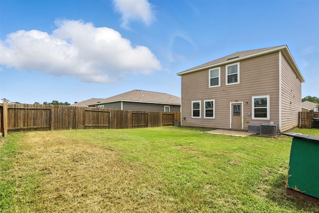 22052 Angelico Dr, Magnolia, TX 77355 - rear view of house with a fenced backyard and a patio