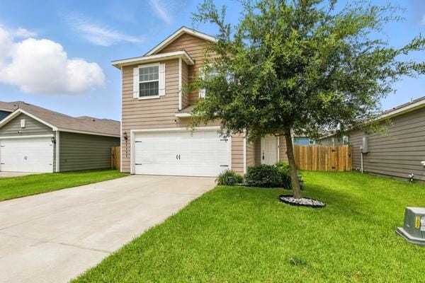 22052 Angelico Dr, Magnolia, TX 77355 - view of front of home featuring driveway and a garage