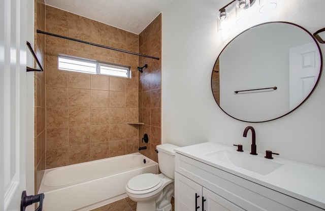 bathroom with shower / bath combination, toilet, vanity, and tile patterned flooring