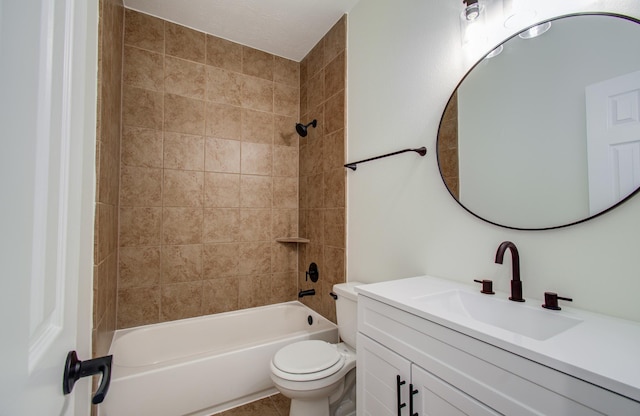 full bath featuring tub / shower combination, toilet, and vanity