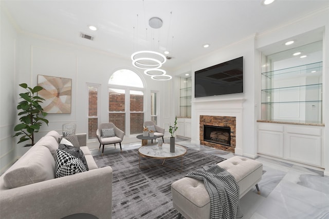 living area with ornamental molding, a fireplace, visible vents, and recessed lighting