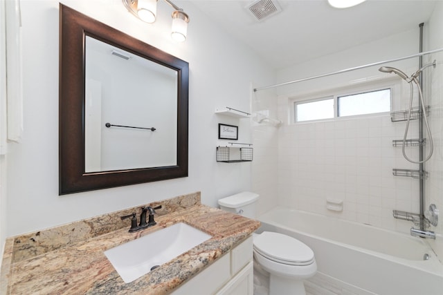 bathroom with  shower combination, visible vents, vanity, and toilet