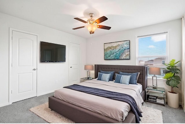 bedroom featuring carpet, a ceiling fan, and baseboards