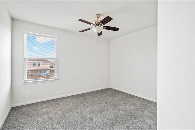 unfurnished room with carpet, baseboards, and ceiling fan