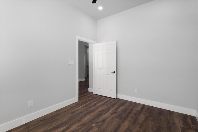 unfurnished room with dark wood-style floors, recessed lighting, ceiling fan, and baseboards