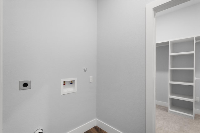 laundry area featuring washer hookup, hookup for an electric dryer, gas dryer hookup, laundry area, and baseboards