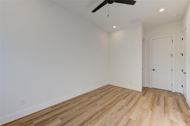 empty room featuring ceiling fan, recessed lighting, light wood-style flooring, and baseboards