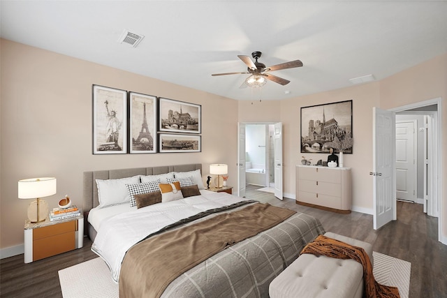 bedroom featuring visible vents, baseboards, and wood finished floors