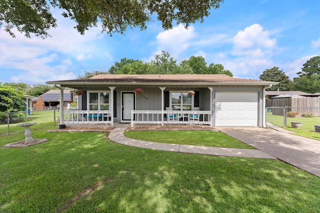 ranch-style house featuring a porch, a front yard, fence, a garage, and driveway