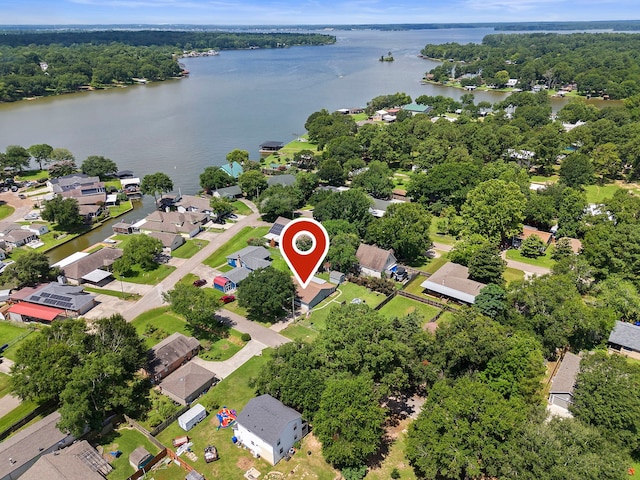 bird's eye view with a water view and a residential view