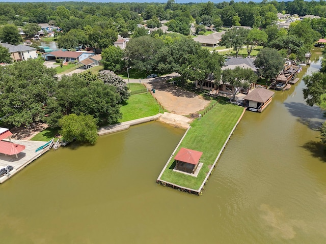 bird's eye view with a residential view and a water view