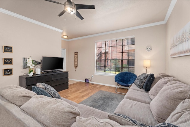 2255 Braeswood Park Dr Unit 265, Houston, TX 77030 - living area featuring ornamental molding, a ceiling fan, wood finished floors, and baseboards