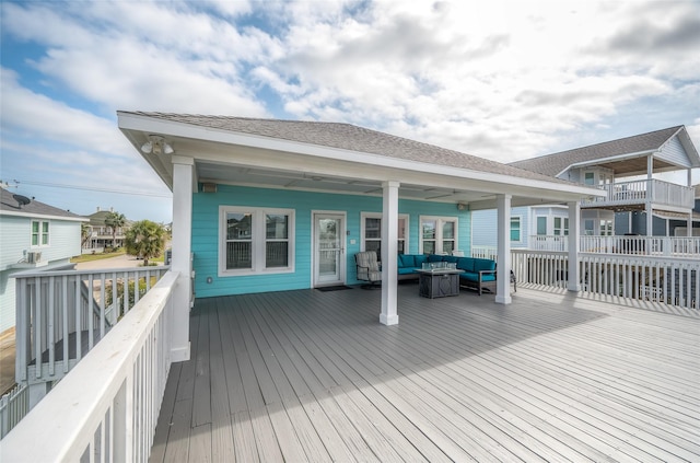 deck with an outdoor living space