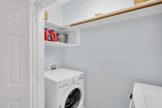 washroom with washer / dryer and laundry area