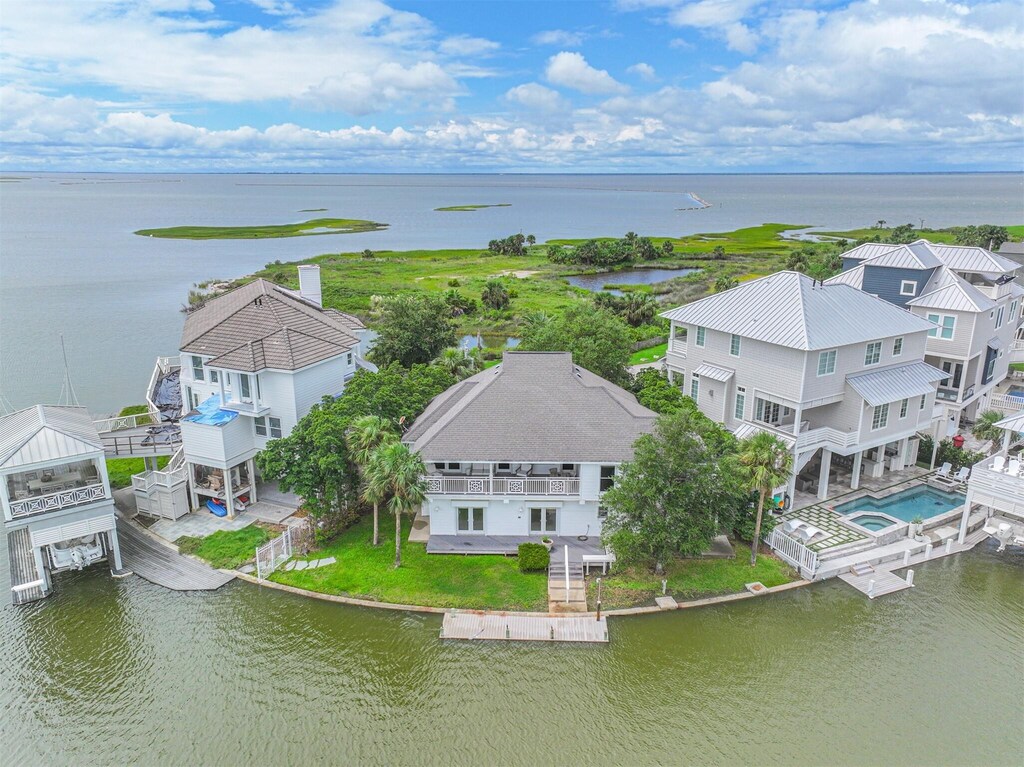 3434 Treasure Cir, Galveston, TX 77554 - bird's eye view with a water view and a residential view