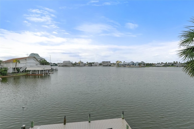 view of water feature with a dock