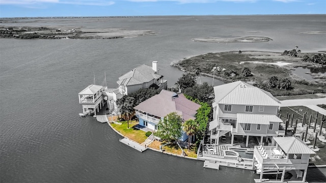 birds eye view of property featuring a residential view and a water view