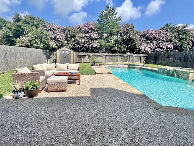 view of pool with a storage unit, a fenced backyard, and a fenced in pool